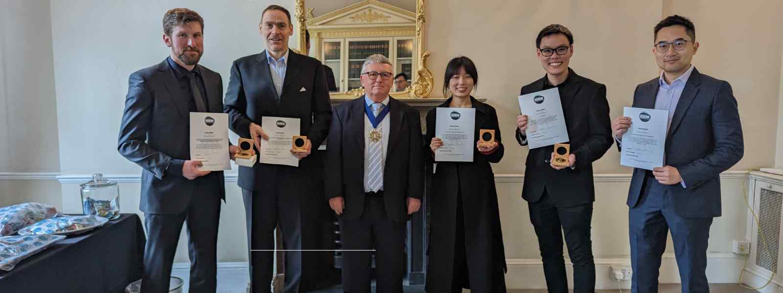 Strathclyde's Professor Gerasimos Theotokatos (second left) with other IMarEST award winnners receiving their medals and certificates from IMarEST President Martin Shaw (third left). Photo courtesy of IMarEST Strathclyde's Professor Gerasimos Theotokatos (second left) with other IMarEST award winnners receiving their medals and certificates from IMarEST President Martin Shaw (third left). Photo courtesy of IMarEST