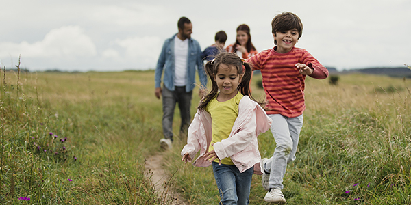 A family out walking in the countryside