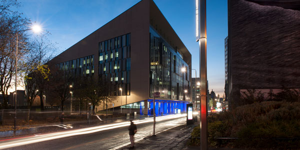 a long exposure shot of the technology and innovation centre at dusk, with lights streaming through george street a long exposure shot of the technology and innovation centre at dusk, with lights streaming through george street